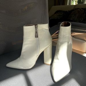 White pointy block heel booties. Worn once.